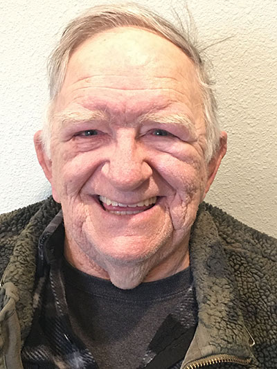 patient at Kanellis Family Dentistry showing off his new smile