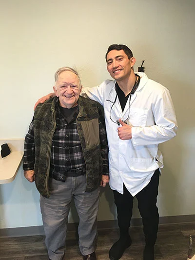 Dr. Kanellis with emergency dentistry patient in Sparks, NV