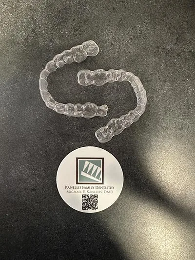 invisalign clear aligners sitting on a table