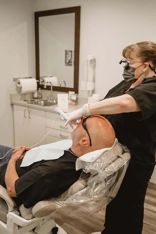 patient receiving a cosmetic dentistry scan at Kanellis Family Dentistry